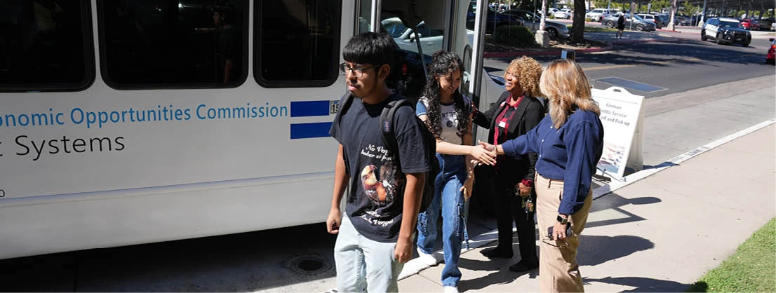 students getting on shuttle